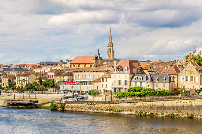 Panoramic view at the Bergerac town from bridge over Dordogne river in France