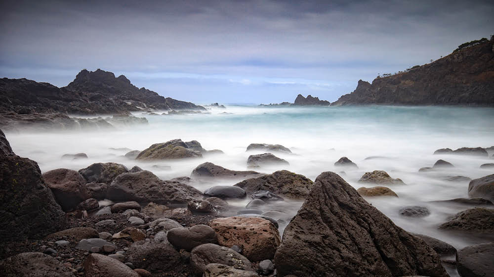 long exposure image of the rocky beach at Seixal on Madeira; Madeira, Portugal