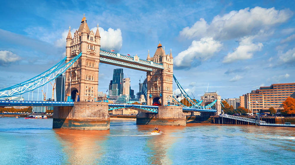 Tower Bridge on a bright sunny day in Autumn. Location - London, England, UK.