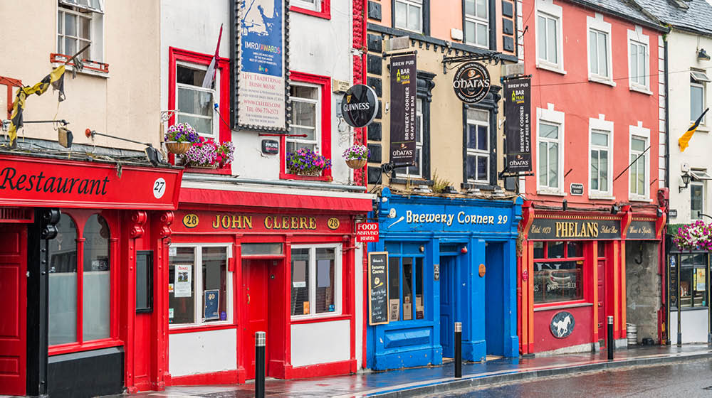 Stock photograph of colorful pubs and restaurants in downtown Kilkenny Ireland