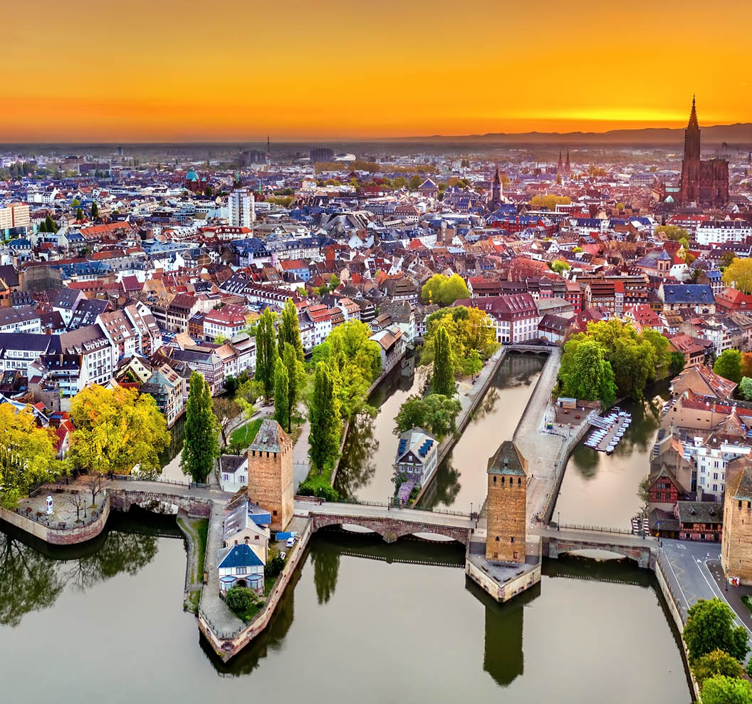 Ponts Couverts Bridges and historic quarter Petite France in Strasbourg at sunrise