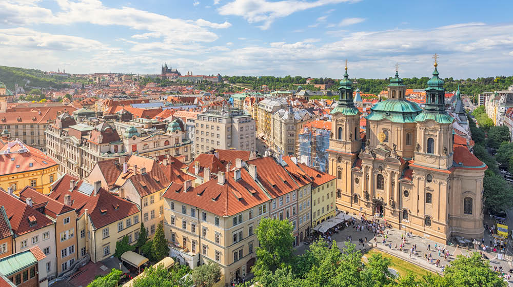 View over central Prague, old town (Stare Mesto) district. On the right is St Nicholas Church, completed in 1737.