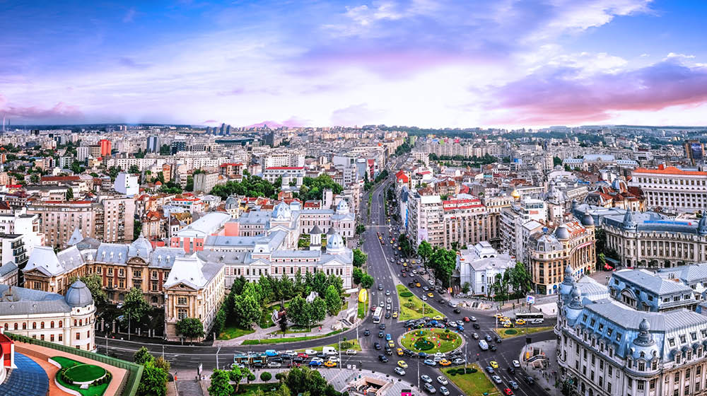 180 Degrees aerial panorama of the capital city of Romania, Bucharest. Blue sky above the center of the city.