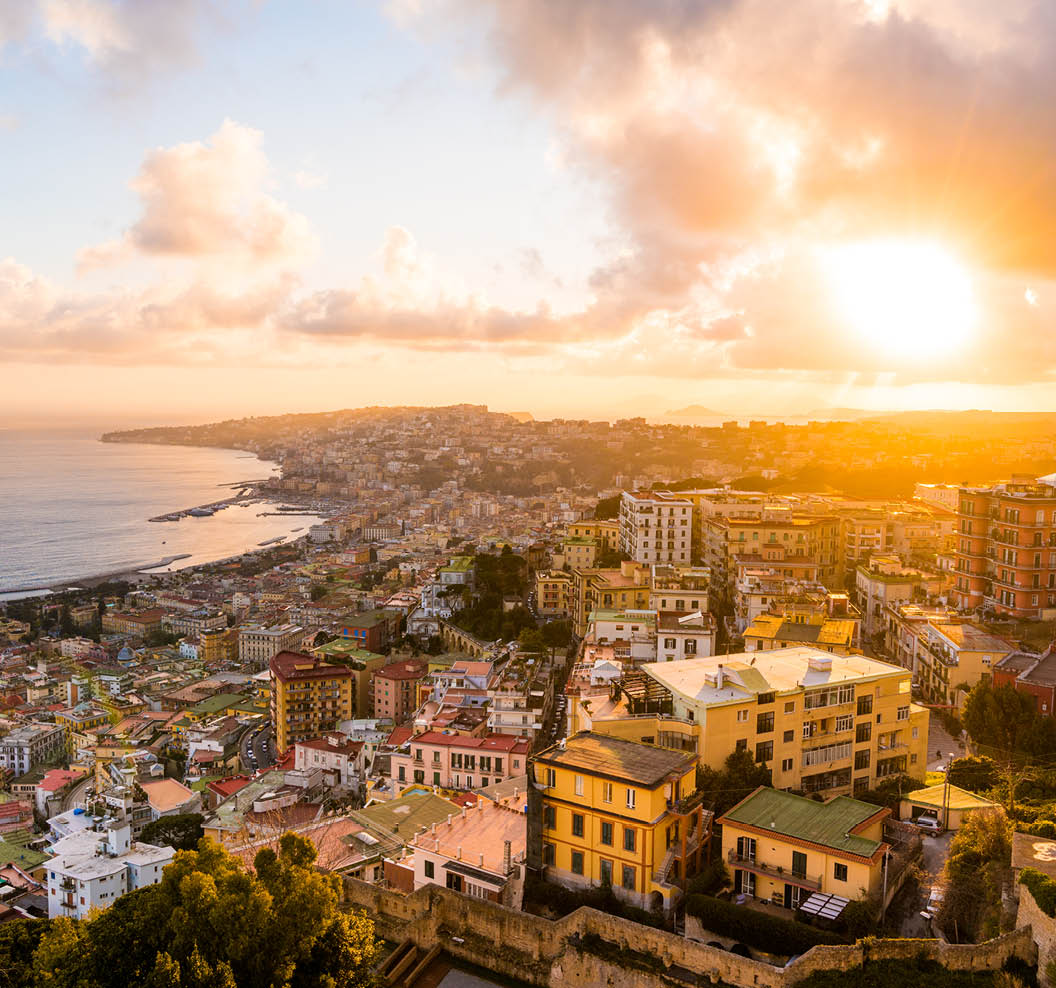 View of the houses and buildings in Naples, Italy during sunset