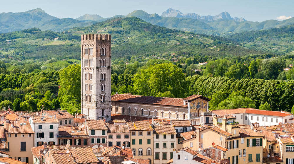 Aerial view of Lucca, in Tuscany, during a sunny afternoon; the bell tower belongs to the San Frediano church