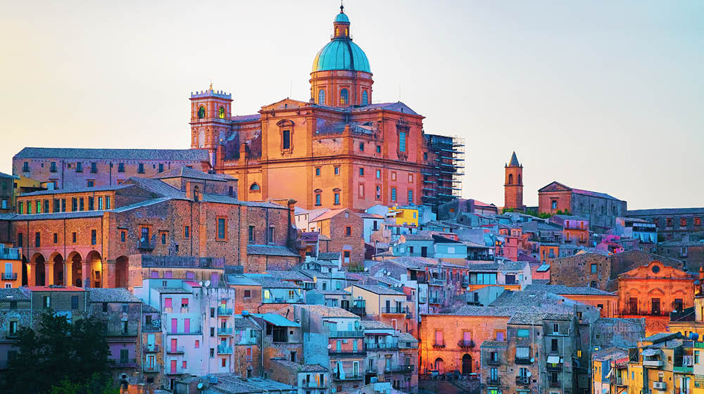 Piazza Armerina Cathedral and its old town, Sicily, Italy. In the evening