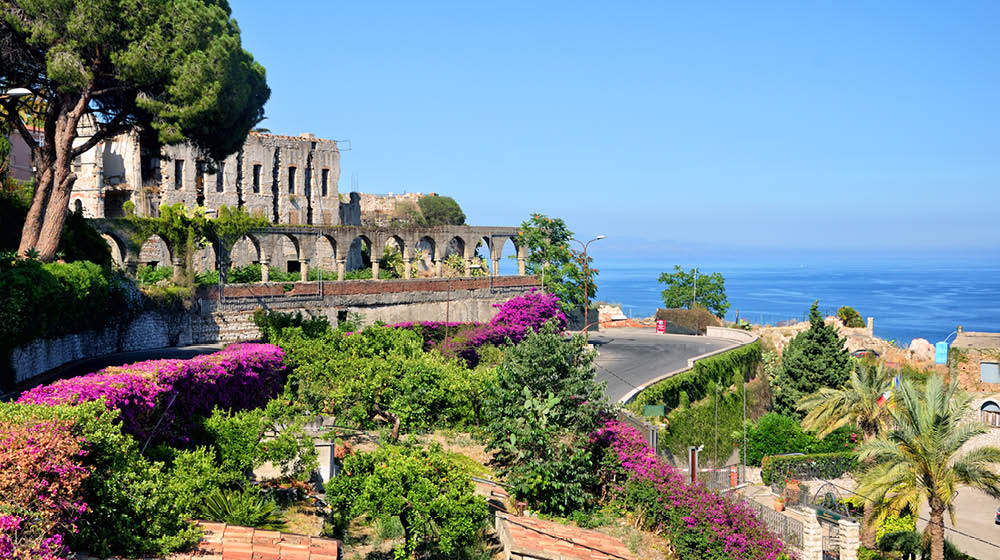 Taormina town with Mediterranean Sea on background