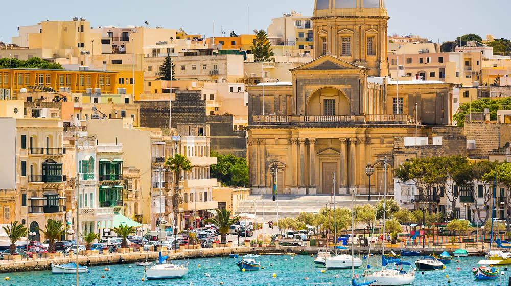 many little yachts and boats from plan wiev to the bay near Valletta in Malta