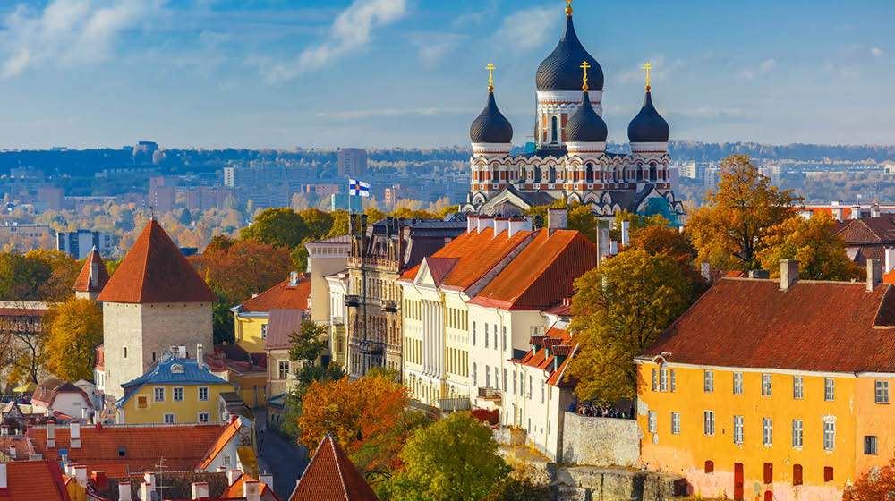 Toompea hill with tower Pikk Hermann and Russian Orthodox Alexander Nevsky Cathedral, view from the tower of St. Olaf church, Tallinn, Estonia