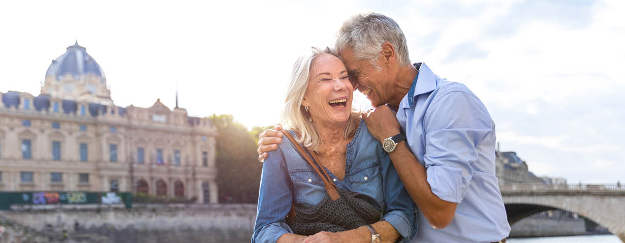 Senior couple in vacation, spending their holidays visiting the beautiful city of Paris, France.