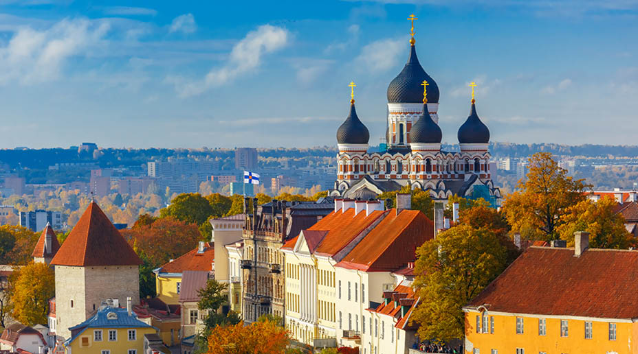 Toompea hill with tower Pikk Hermann and Russian Orthodox Alexander Nevsky Cathedral, view from the tower of St. Olaf church, Tallinn, Estonia