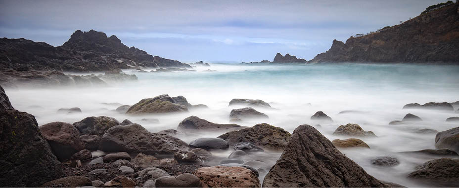long exposure image of the rocky beach at Seixal on Madeira; Madeira, Portugal