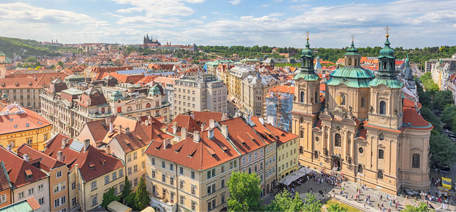 View over central Prague, old town (Stare Mesto) district. On the right is St Nicholas Church, completed in 1737.