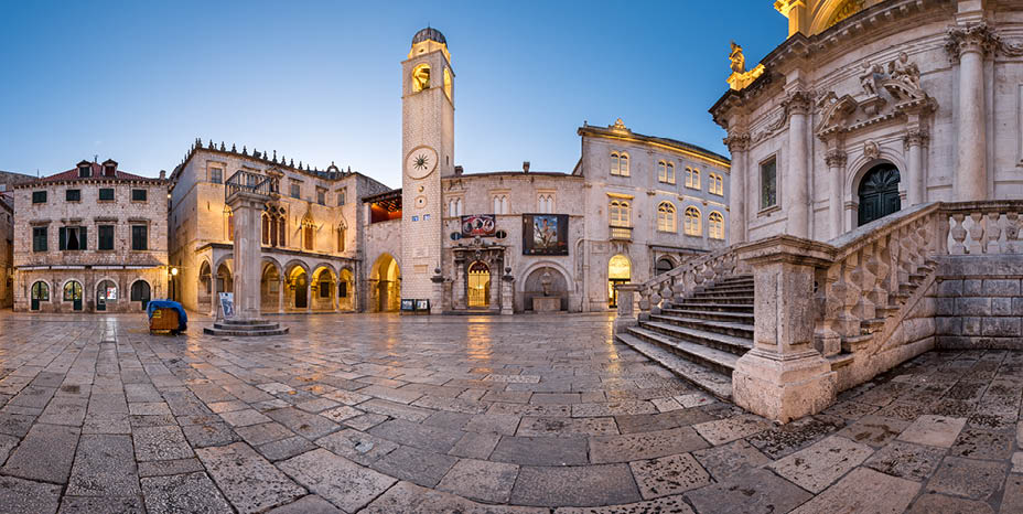 DUBROVNIK, CROATIA - JULY 1, 2014: Panorama of Luza Square and Sponza Palace in Dubrovnik. In 1979, the city of Dubrovnik joined the UNESCO list of World Heritage Sites.
