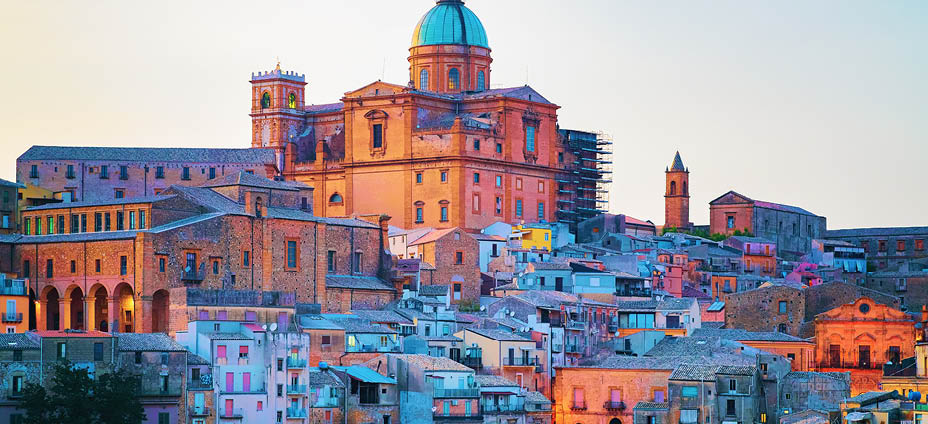 Piazza Armerina Cathedral and its old town, Sicily, Italy. In the evening