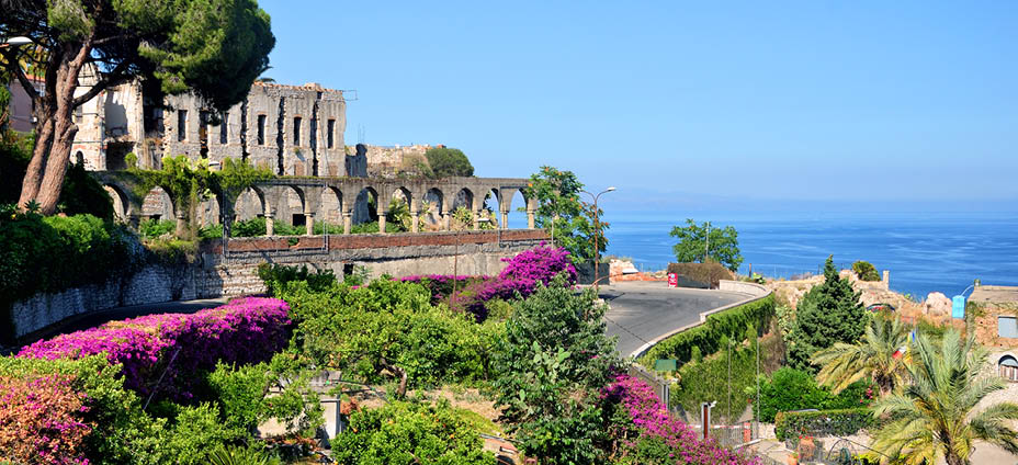 Taormina town with Mediterranean Sea on background